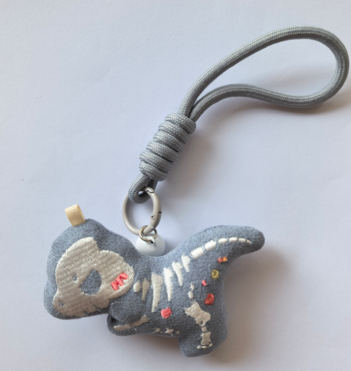 Dinosaur Plush Badge / Fridge Magnet — Dilophosaurus