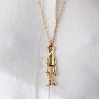 The New Wizard Of Oz
Tin Man Pendant
Necklace Lele Sadoughi